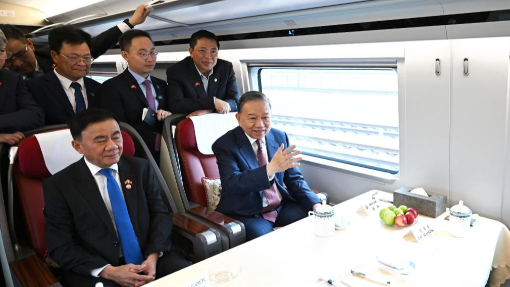 General Secretary of the Communist Party of Vietnam Central Committee and Vietnamese President To Lam, who is on a state visit to China, sits on a high-speed train on his way from Beijing, capital of China, to south China's Guangxi Zhuang Autonomous Region, April 16, 2026. /Xinhua