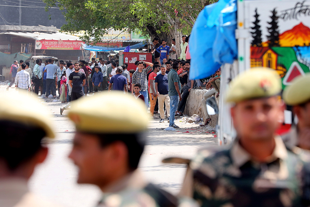 As protests broke out, a heavy police presence was maintained in the area near the Phase 2 Hosiery Complex in Noida, Uttar Pradesh, India, on April 14, 2026. /CFP