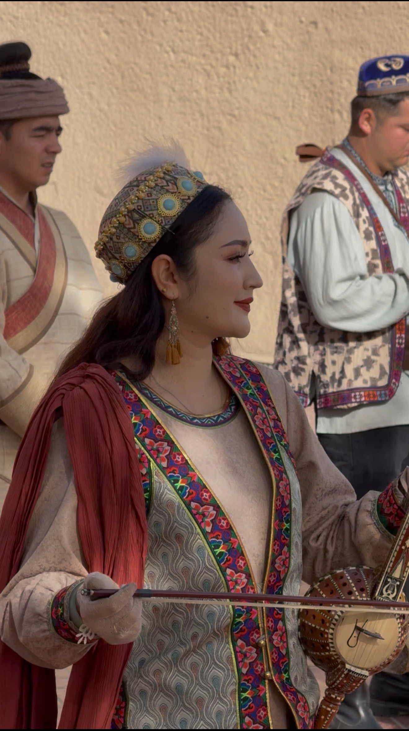 People perform during the gate opening ceremony of the ancient city of Kashi in northwest China's Xinjiang Uygur Autonomous Region on April 17, 2026. /CGTN