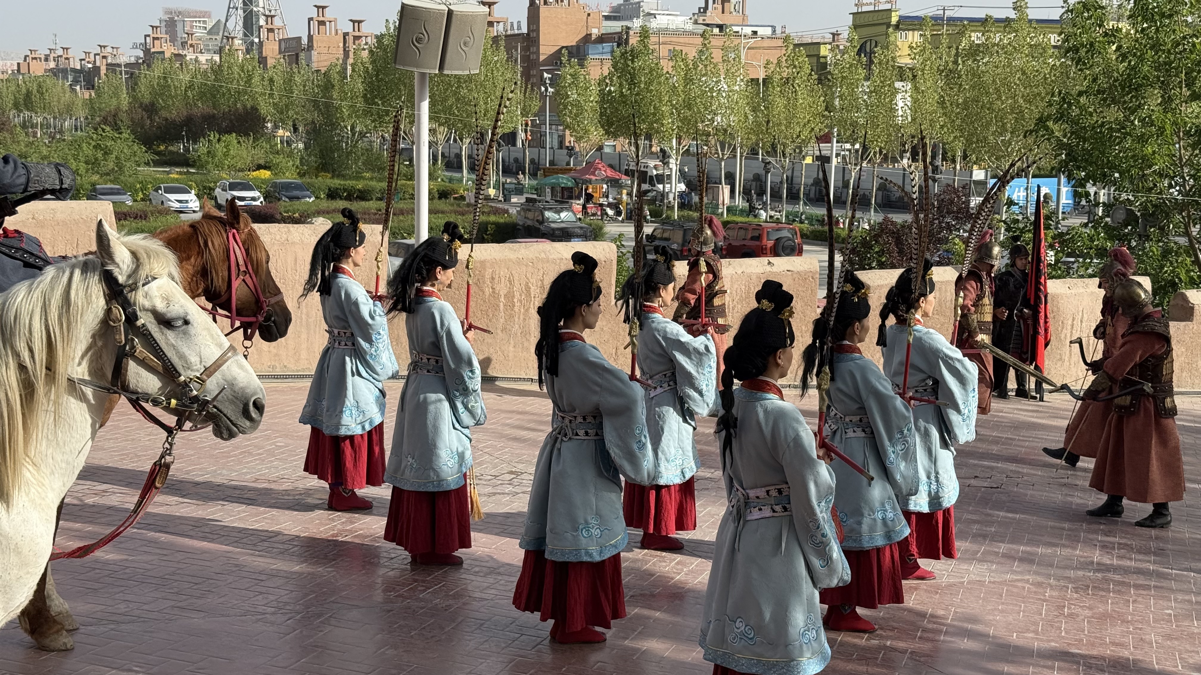 People perform during the gate opening ceremony of the ancient city of Kashi in northwest China's Xinjiang Uygur Autonomous Region on April 17, 2026. /CGTN