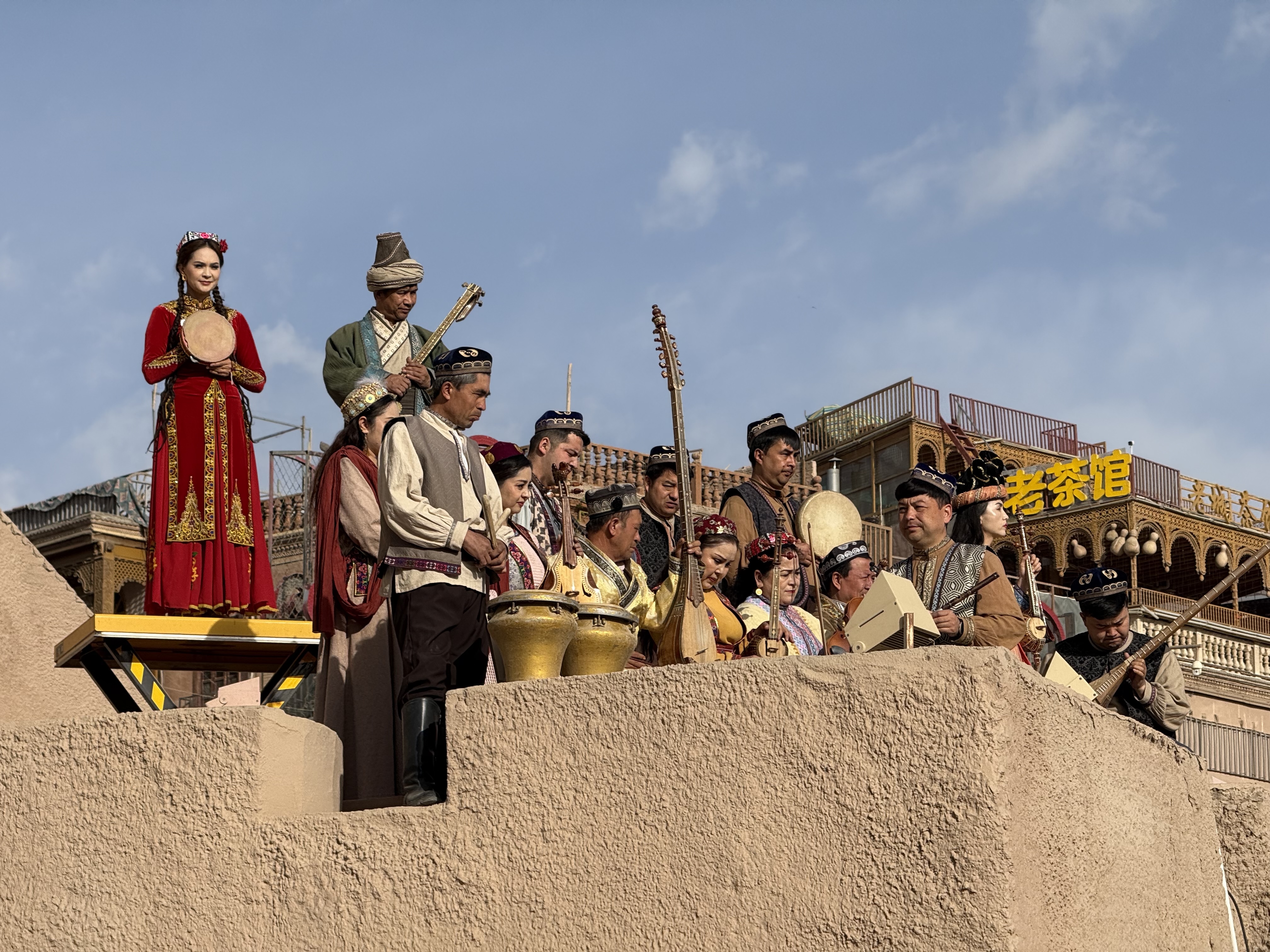 People perform during the gate opening ceremony of the ancient city of Kashi in northwest China's Xinjiang Uygur Autonomous Region on April 17, 2026. /CGTN