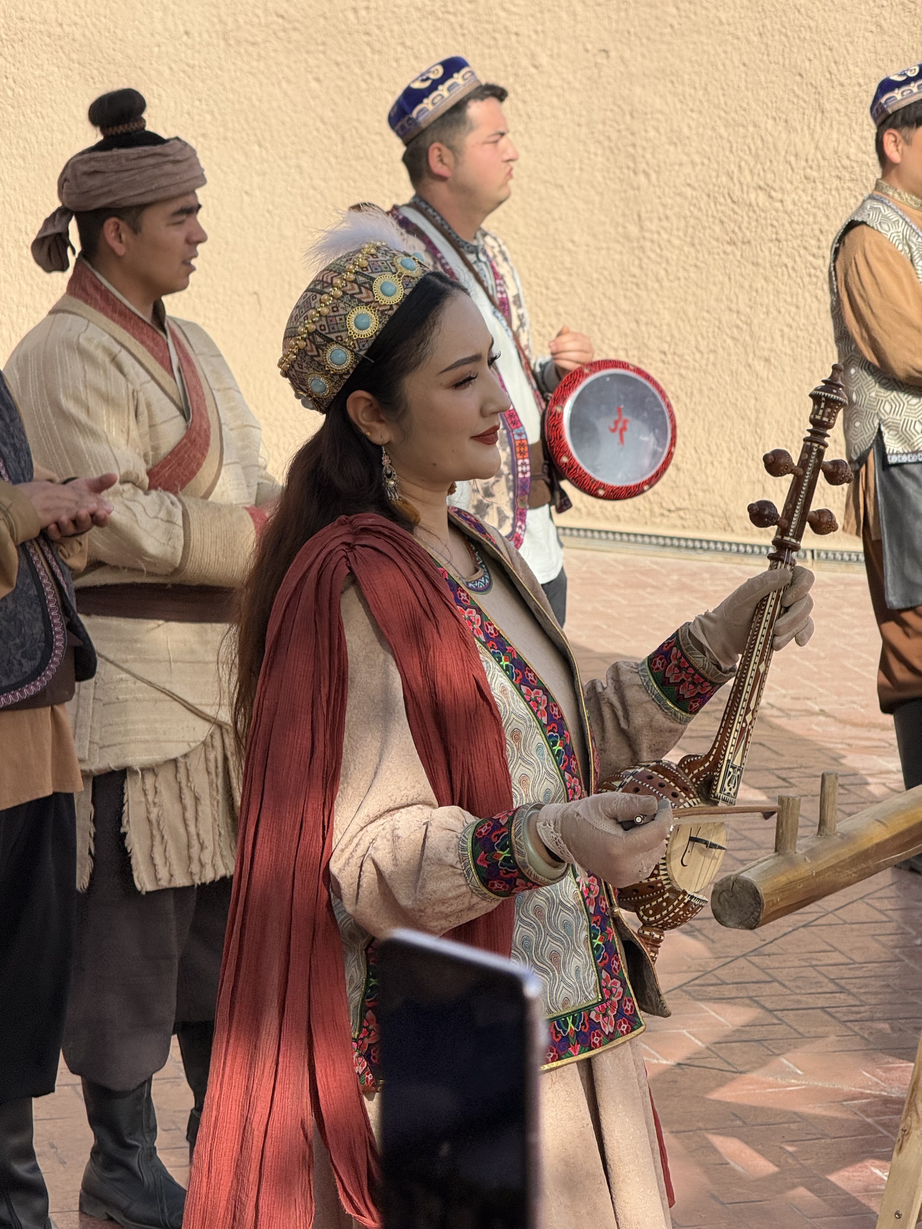 People perform during the gate opening ceremony of the ancient city of Kashi in northwest China's Xinjiang Uygur Autonomous Region on April 17, 2026. /CGTN