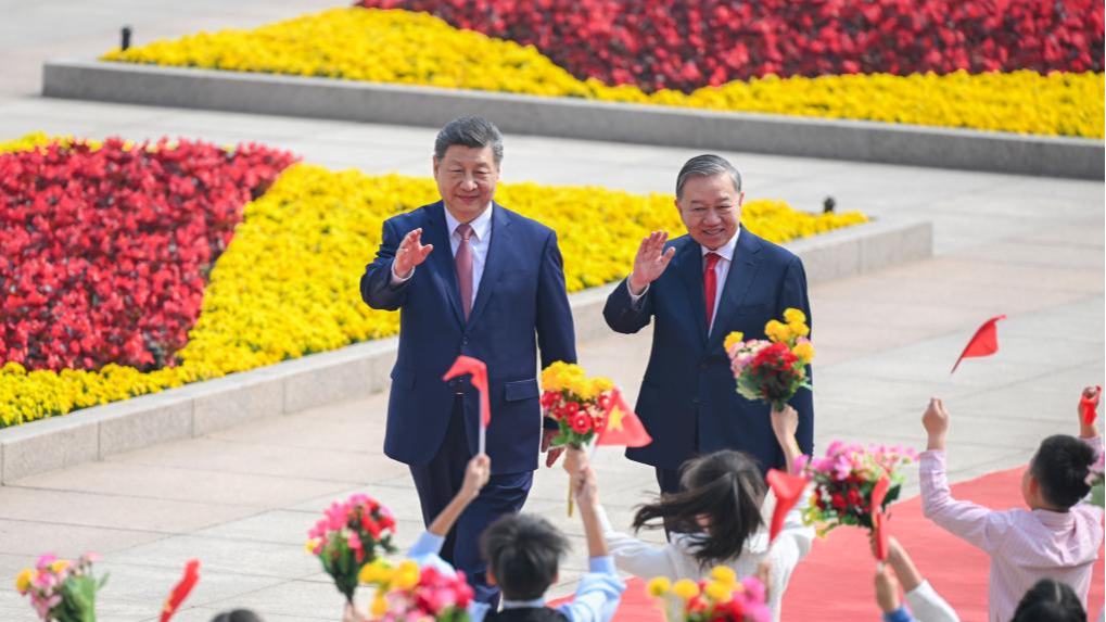 General Secretary of the Communist Party of China Central Committee and Chinese President Xi Jinping holds a welcome ceremony for General Secretary of the Communist Party of Vietnam Central Committee and Vietnamese President To Lam at the square outside the east gate of the Great Hall of the People prior to their talks in Beijing, capital of China, April 15, 2026. 