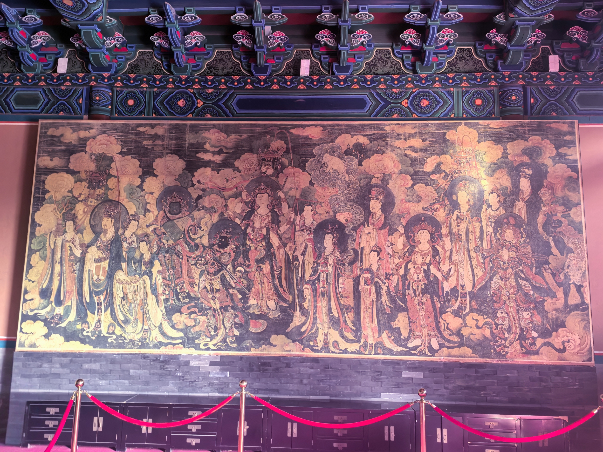A replica of the Buddhist guardian deities' fresco is displayed at Fahai Temple in Beijing, February 23, 2026. /CGTN