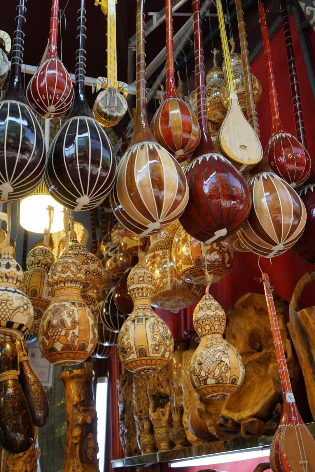 Intangible cultural items are seen at the ancient city of Kashi in northwest China's Xinjiang Uygur Autonomous Region on April 18, 2026. /CGTN