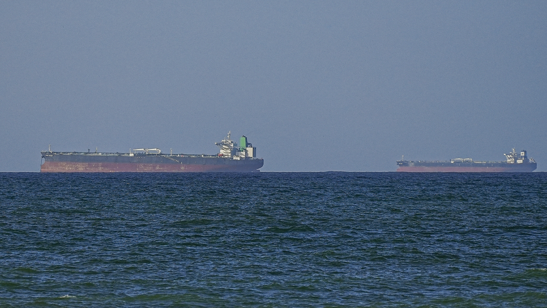 Iran warns Strait of Hormuz may not stay open as tensions escalate