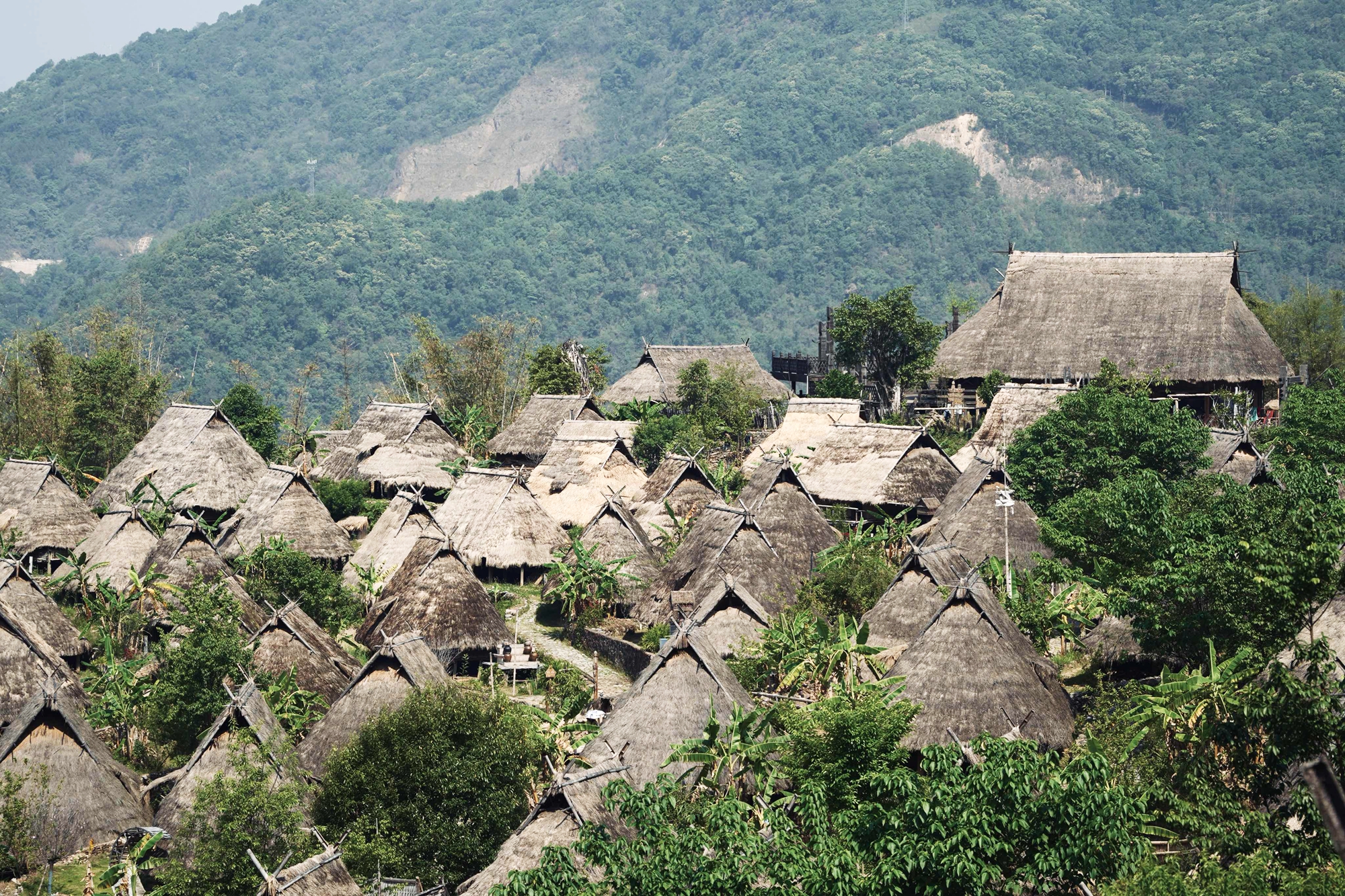 Wengding Ancient Village is seen tucked deep in the mountains of Yunnan Province. /CGTN