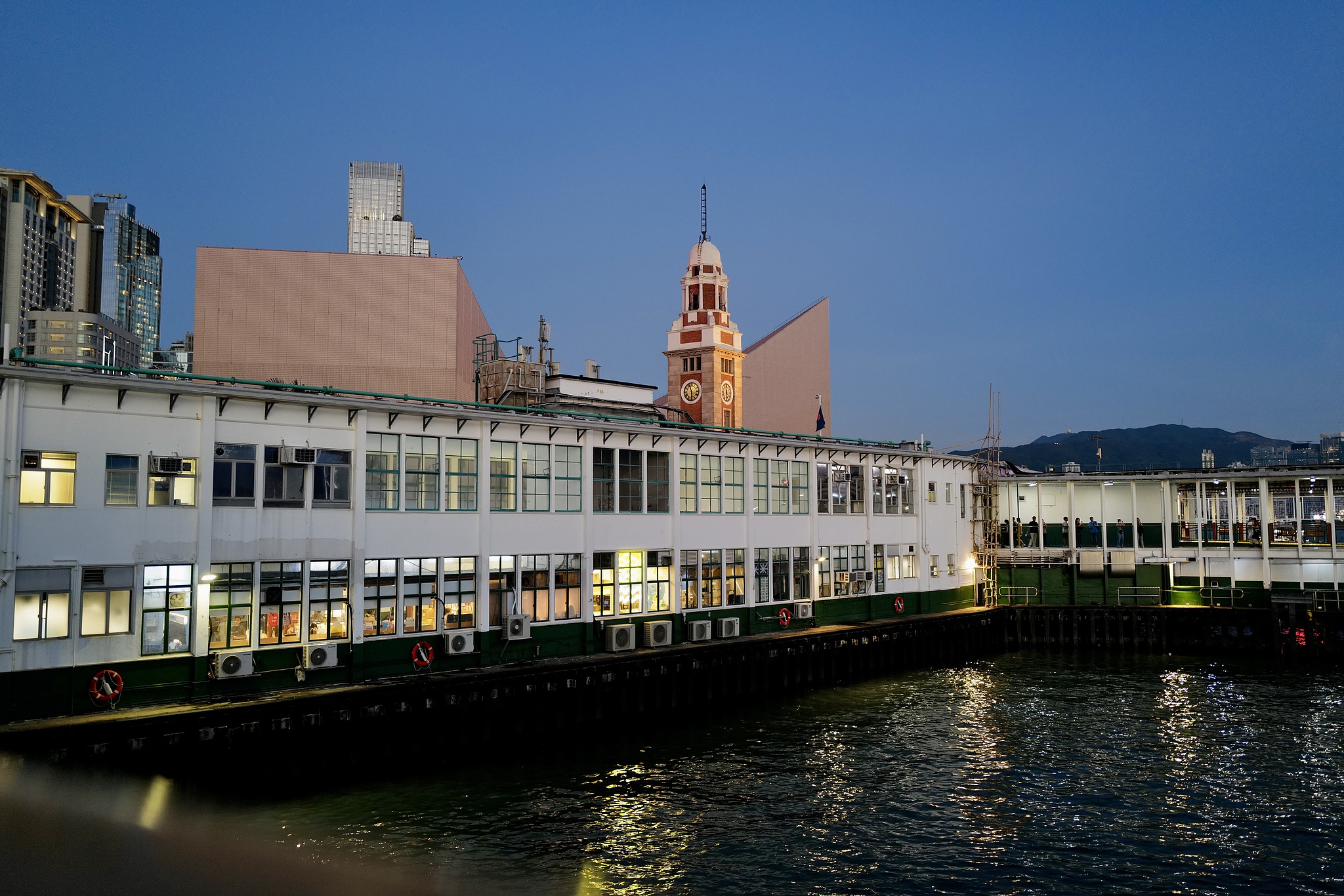 A view of the Tsim Sha Tsui Star Ferry Pier, Tsim Sha Tsui Clock Tower and the Hong Kong Cultural Center, HKSAR, China. /VCG 