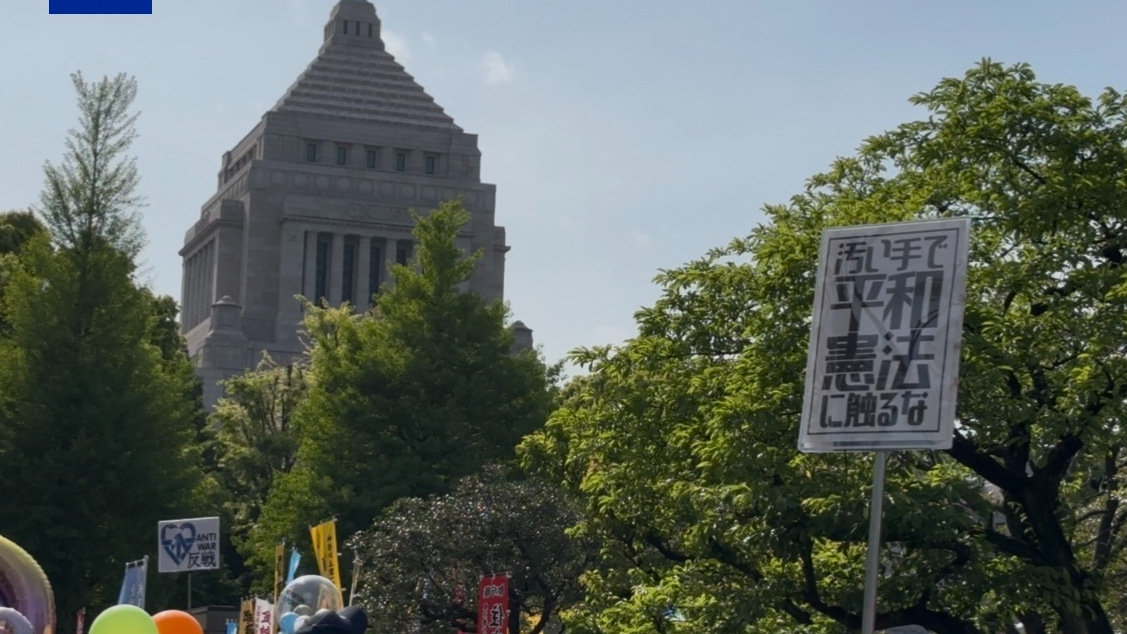 Japanese protesters rally against government's militarization push