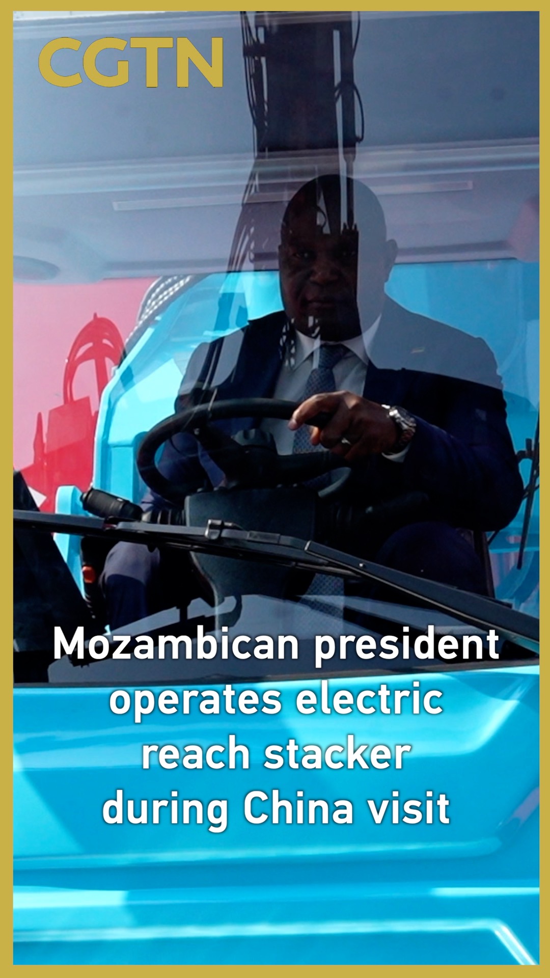 Mozambican president operates electric reach stacker during China visit