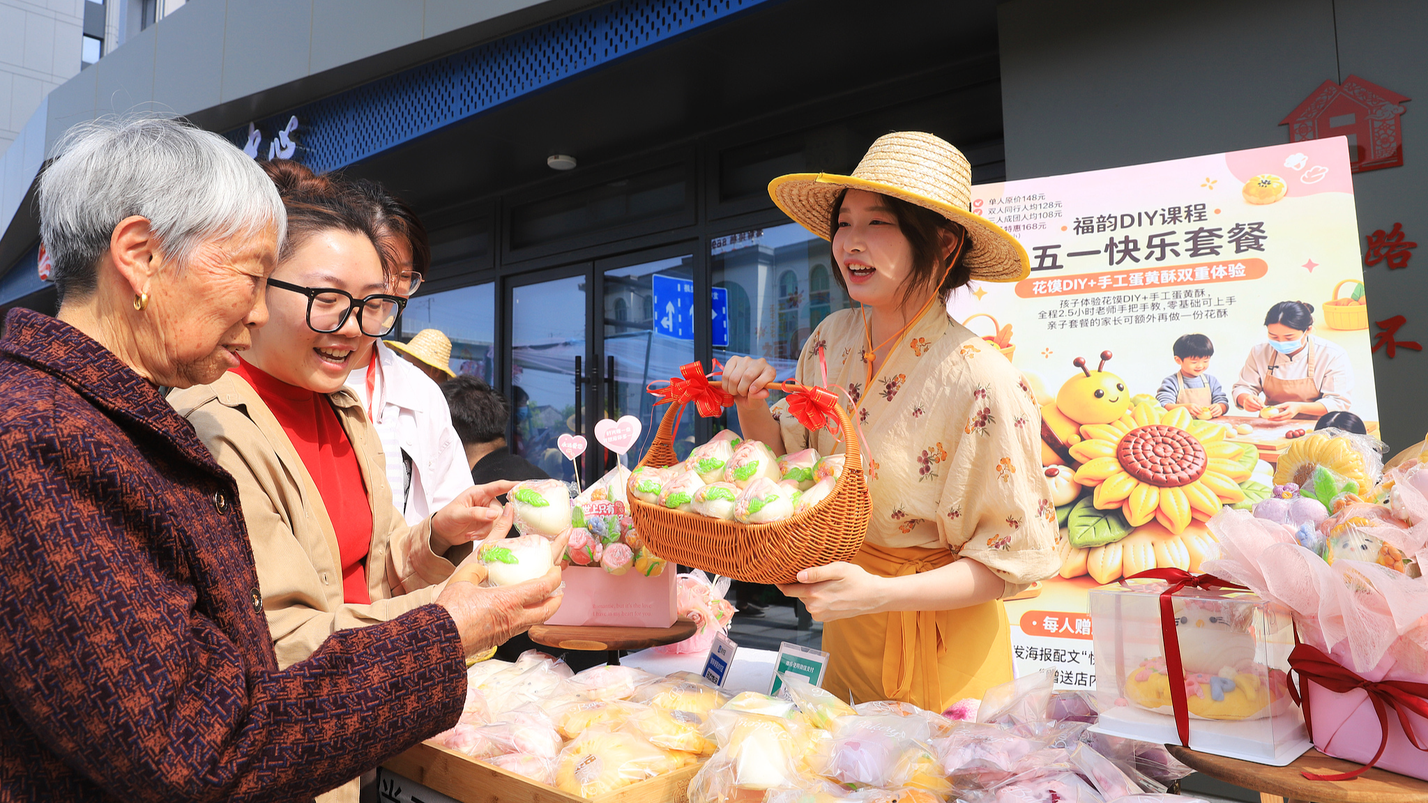 A market event bringing local specialty agricultural products, delicacies and cultural products to the community is held in Taizhou, east China's Zhejiang Province, April 19, 2026. /VCG