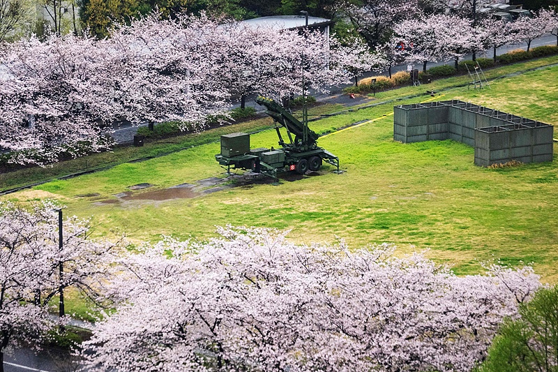 A Patriot Advanced Capability-3 (PAC-3) missile launcher is positioned next to fully bloomed cherry trees at the Defense Ministry in Tokyo, April 1, 2026. /CFP