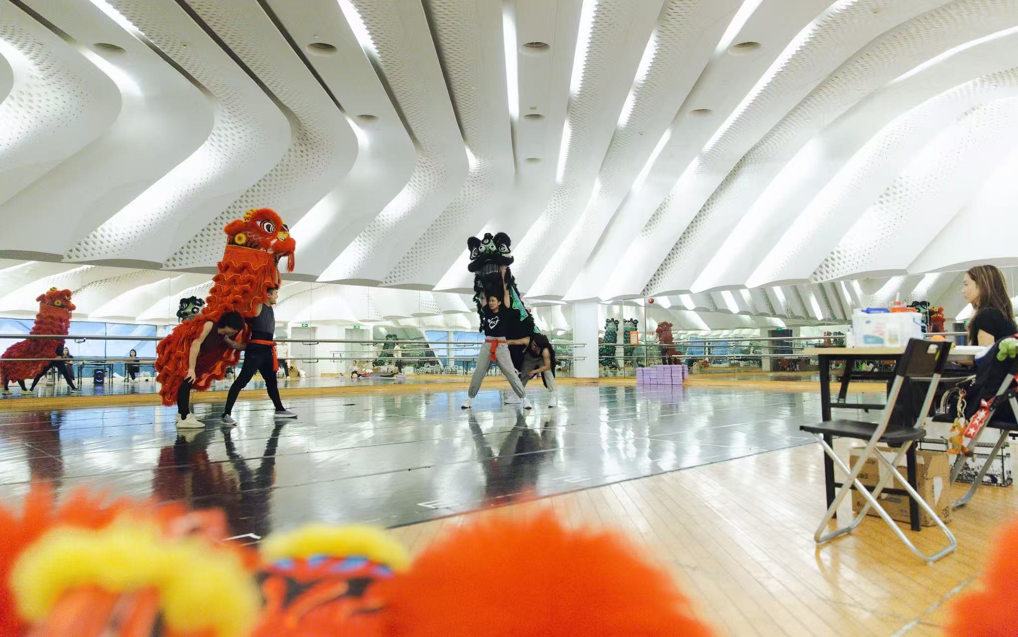 Actors practice lion dance during rehearsal. Xia Dong/Guangzhou Opera House