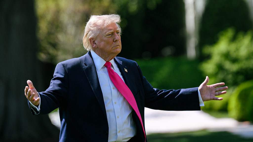 US President Donald Trump speaks with members of the media before boarding Marine One on the South Lawn of the White House, US, April 16, 2026. /VCG