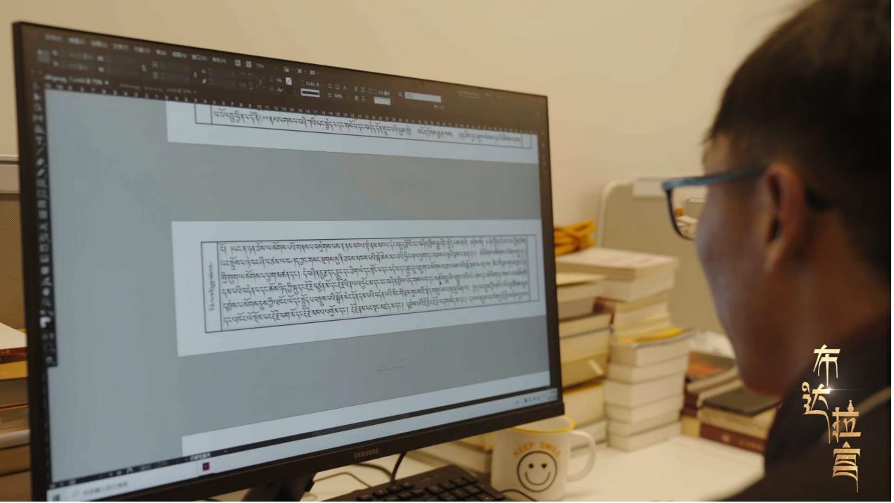 Staff members are digitizing ancient texts in the Ancient Texts Library at Nenang Monastery, Lhasa, southwest China's Xizang Autonomous Region. /CGTN