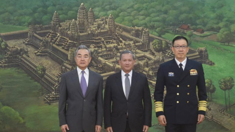 Cambodian Prime Minister Hun Manet (M) meets with Chinese Foreign Minister Wang Yi (L) and Defense Minister Dong Jun in Phnom Penh, capital of Cambodia, April 22, 2026. /Xinhua