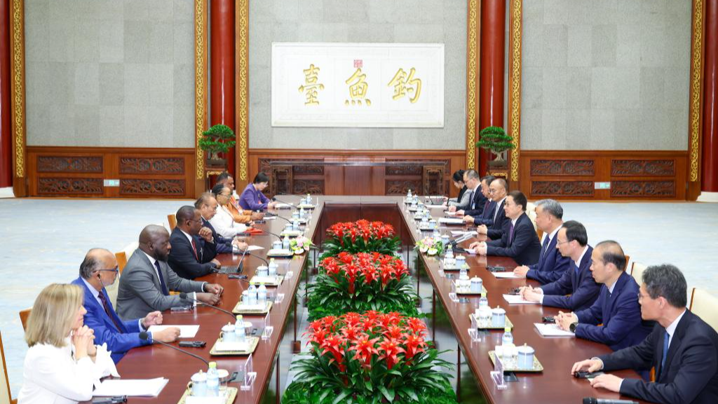 Chinese Vice President Han Zheng meets with foreign attendees of the Third High-Level Conference of the Forum on Global Action for Shared Development in Beijing, capital of China, April 22, 2026. /Xinhua