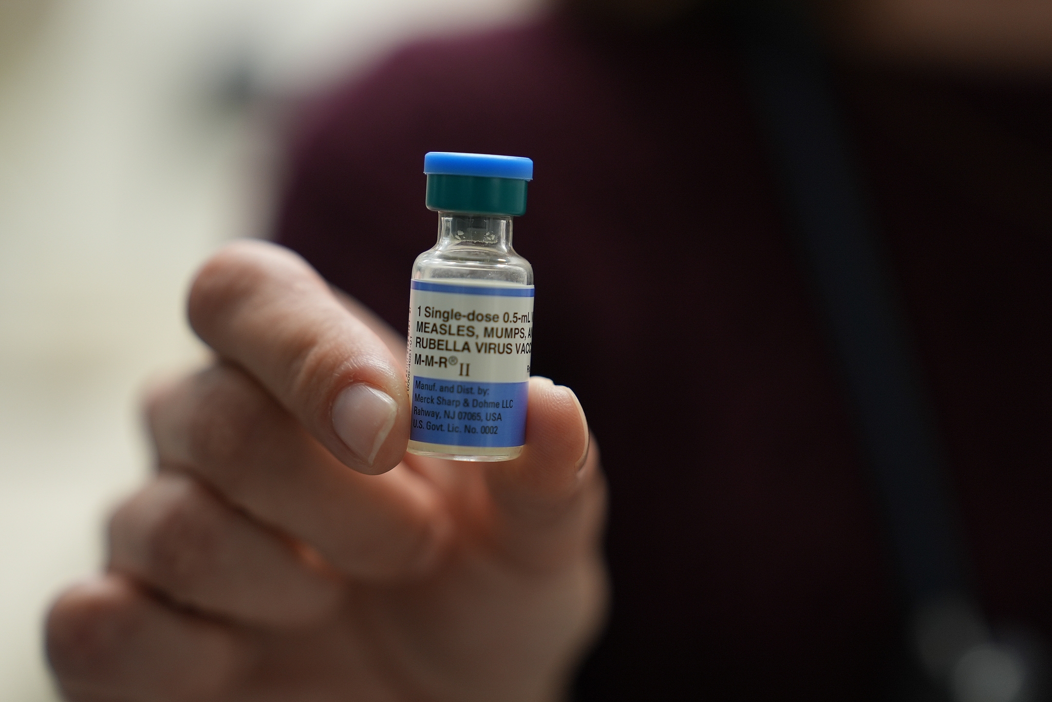 A doctor holds a vial of the combination measles, mumps and rubella vaccine at Prisma Health Pediatrics in Greer, South Carolina, United States, March 18, 2026. /CFP