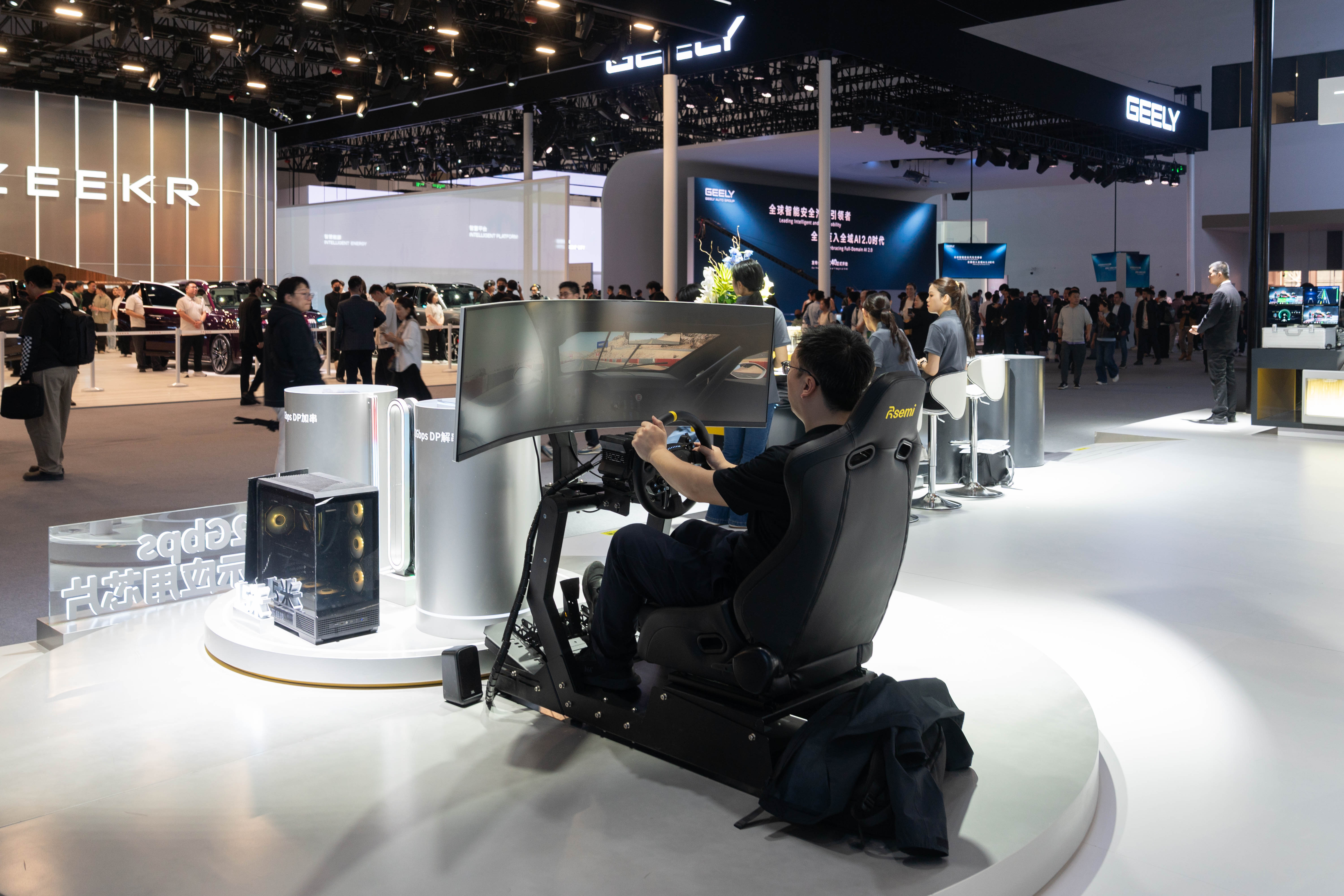 A visitor is experiencing the immersive driving simulator at the 2026 Beijing Automotive Exhibition on April 24, 2026. /CGTN Photographer Qu Bo