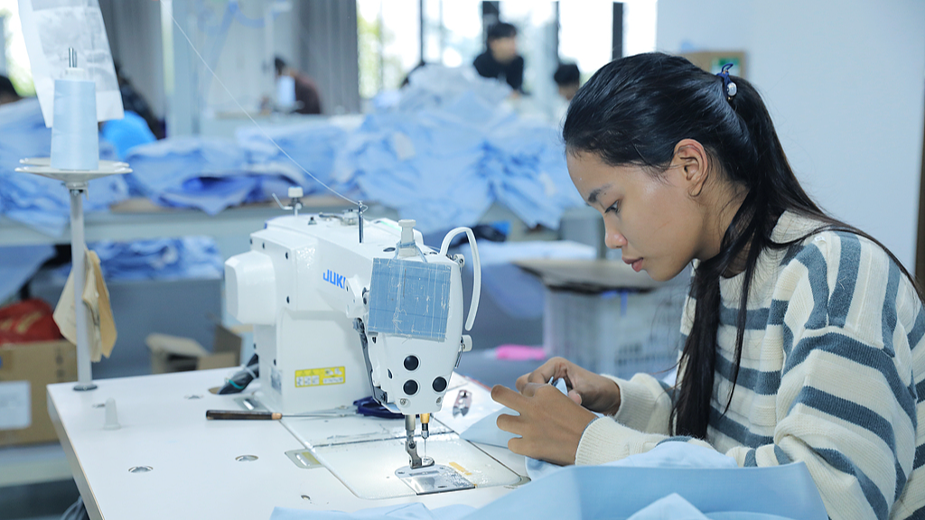A Myanmar worker is sewing clothes at the Ruili Border Industrial Park, Ruili City, Dehong Dai and Jingpo Autonomous Prefecture, southwest China's Yunnan Province, November 7, 2024. /VCG
