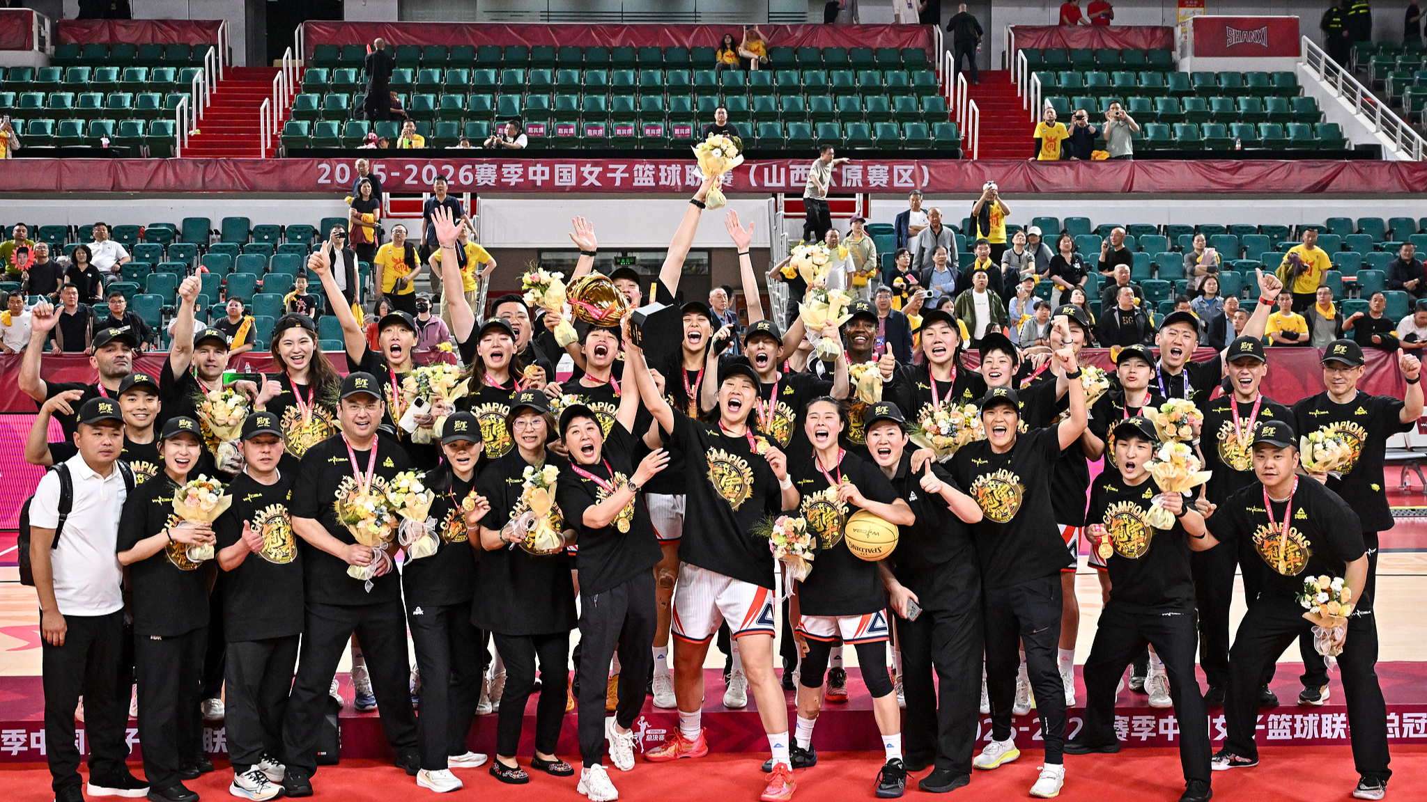 Sichuan's players celebrate after beating Shanxi to win the title in the fifth game of the WCBA Finals in Shanxi, China, April 25, 2026. /VCG