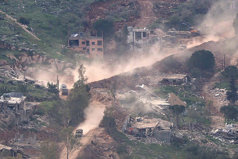 Israeli military vehicles maneuver on the Lebanese side of the border, as seen from the Upper Galilee in northern Israel, amid a ceasefire between Israel and Lebanon, April 25, 2026. /VCG