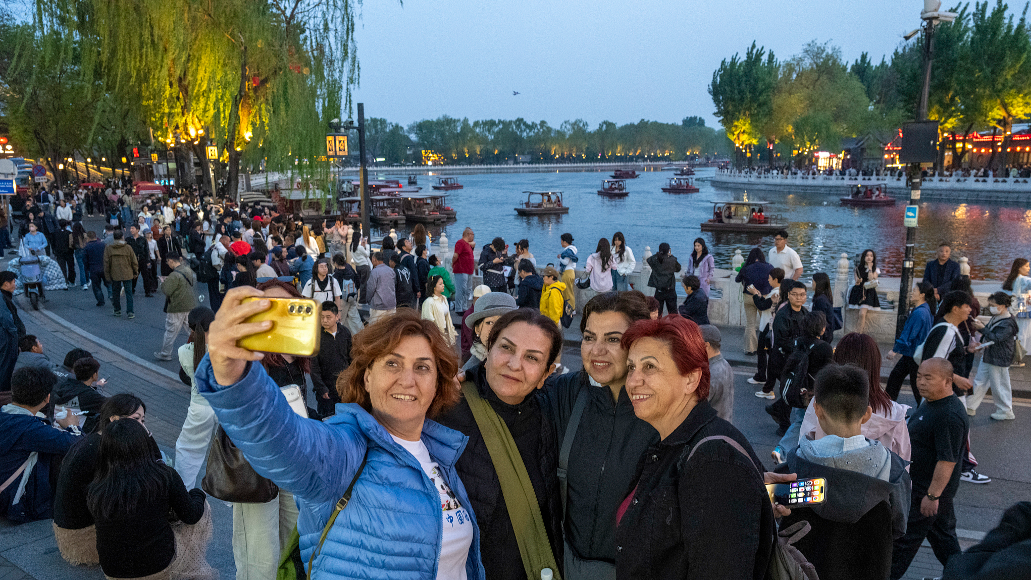 Foreign tourists visit the Shichahai Scenic Area at night in Beijing, China, April 22, 2026. /CFP