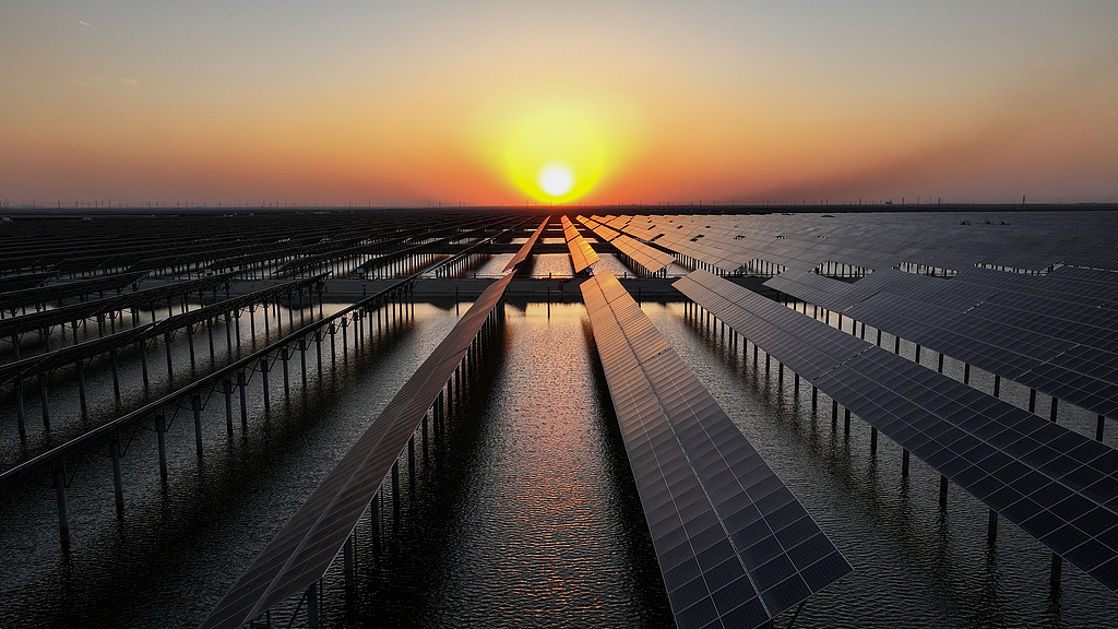 A view of solar panels at sunset, Dongying, east China's Shandong Province, March 20, 2024. /VCG
