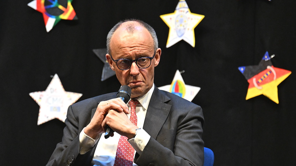 Germany's Chancellor Friedrich Merz takes part in a panel discussion with pupils on European issues, during a visit to Carolus-Magnus-Gymnasium, in Marsberg, Germany, April 27, 2026. /VCG
