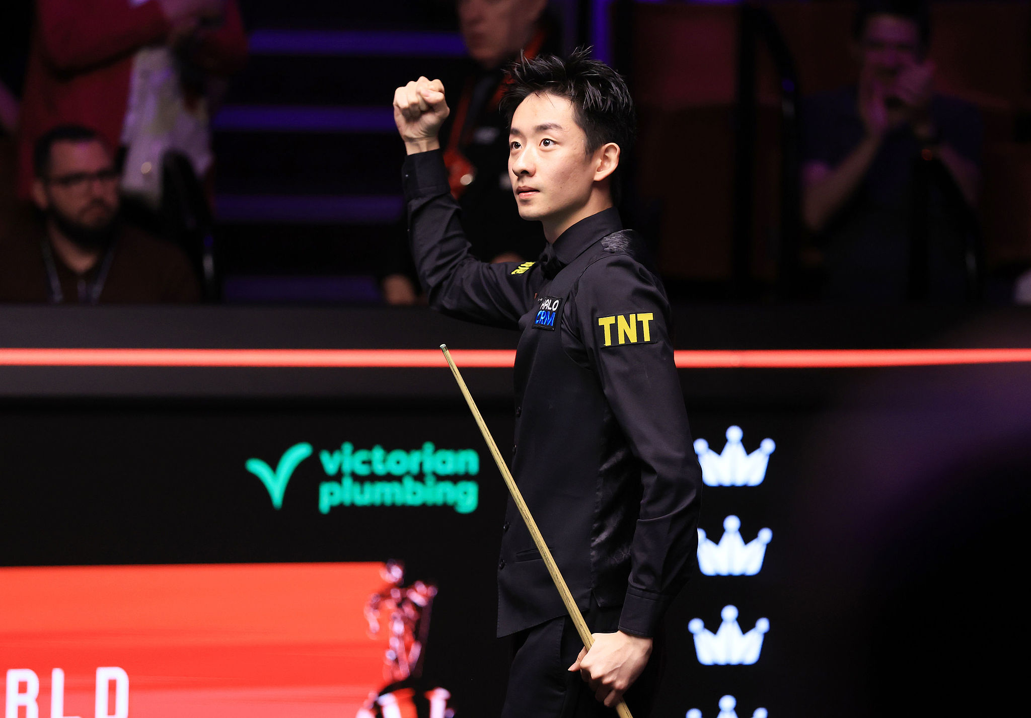 Wu Yize of China celebrates his 13-11 win over Mark Selby of England in the round of 16 at the WPBSA World Snooker Championship in Sheffield, England, April 27, 2026. /VCG