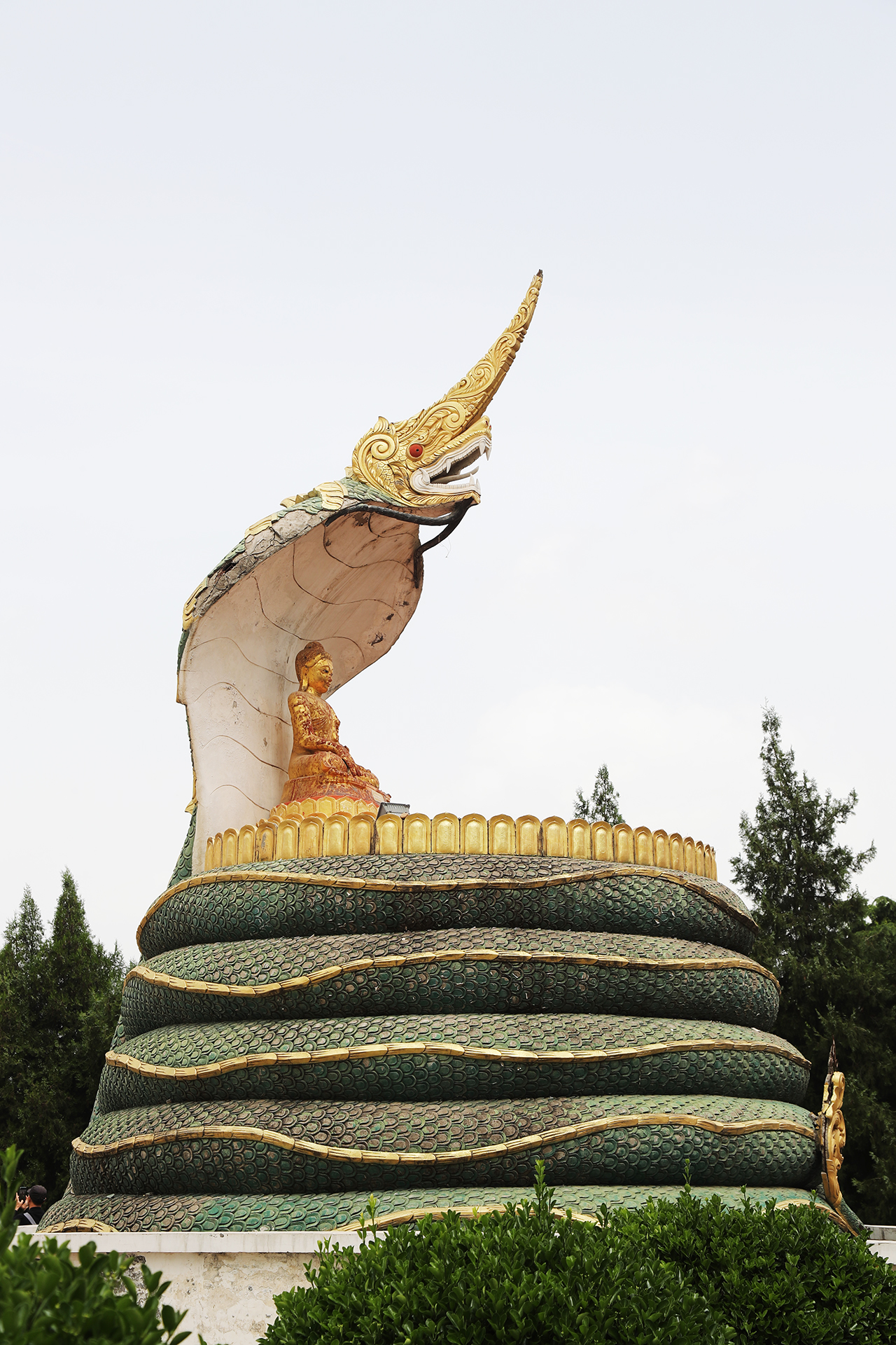 A statue is seen at the Burmese-style Buddhist pagoda area at White Horse Temple in Luoyang, Henan Province. /CGTN