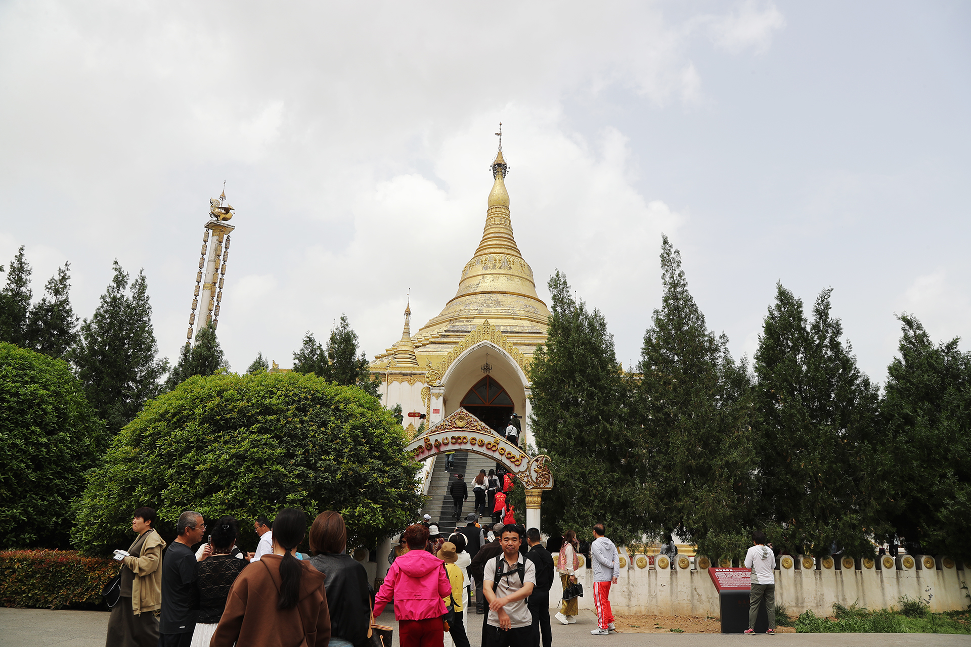 People visit the Burmese-style Buddhist pagoda at White Horse Temple in Luoyang, Henan Province. /CGTN