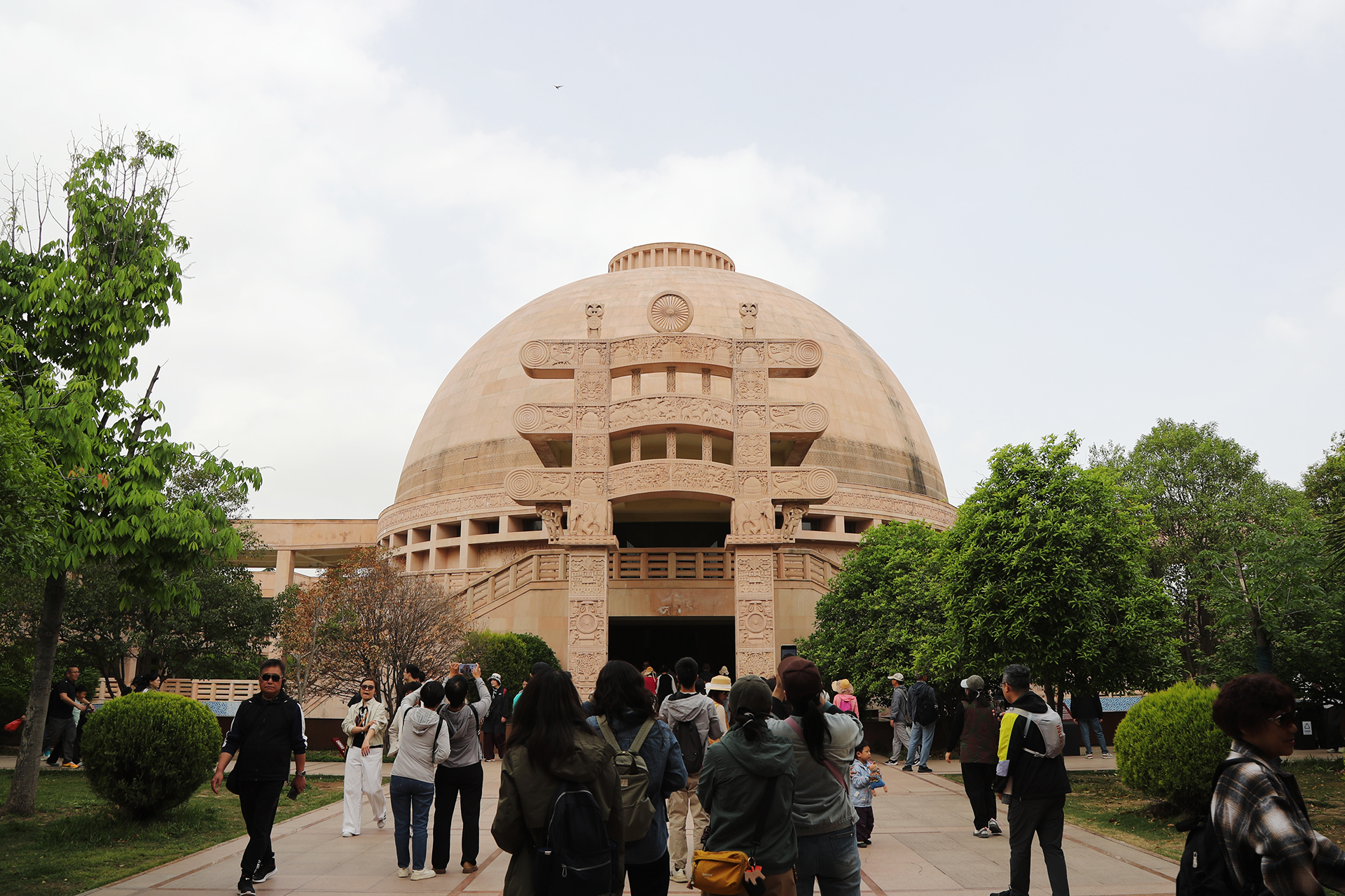 People visit the Indian-style Buddhist temple at White Horse Temple in Luoyang, Henan Province. /CGTN