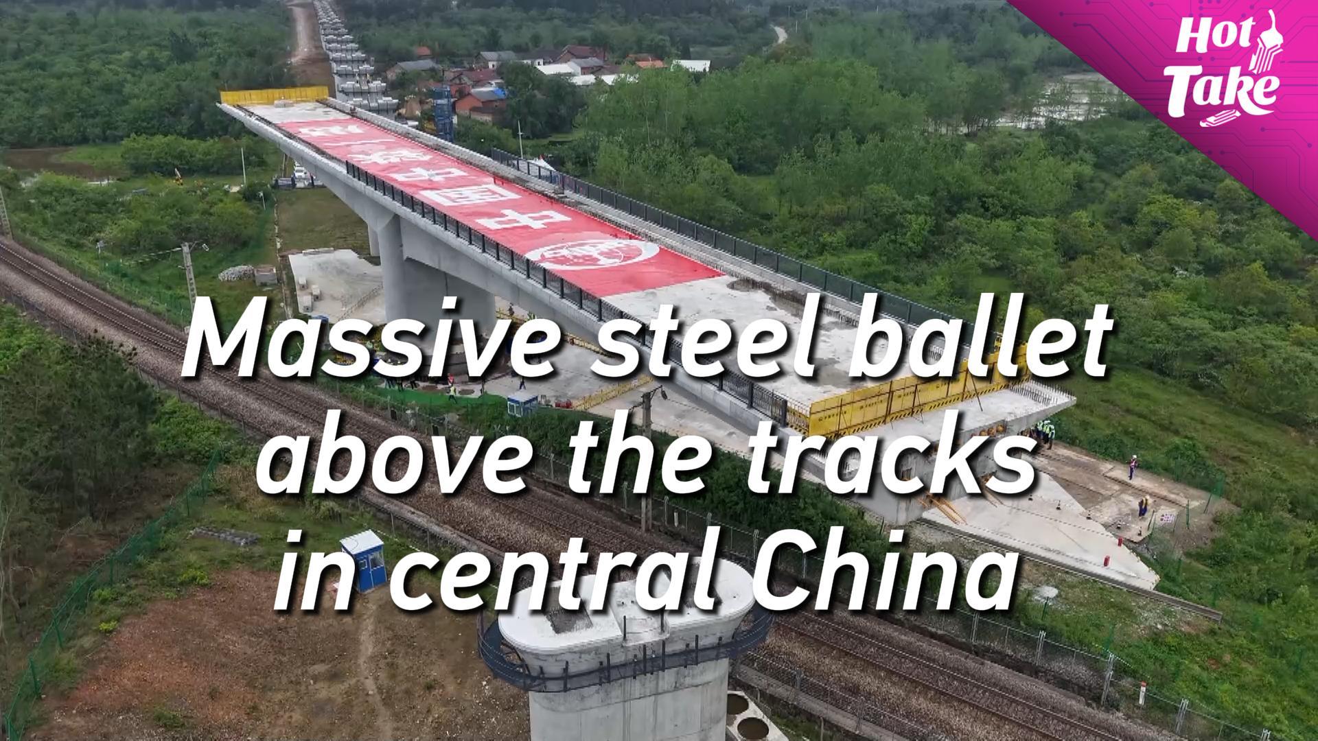 Massive steel ballet above the tracks in central China