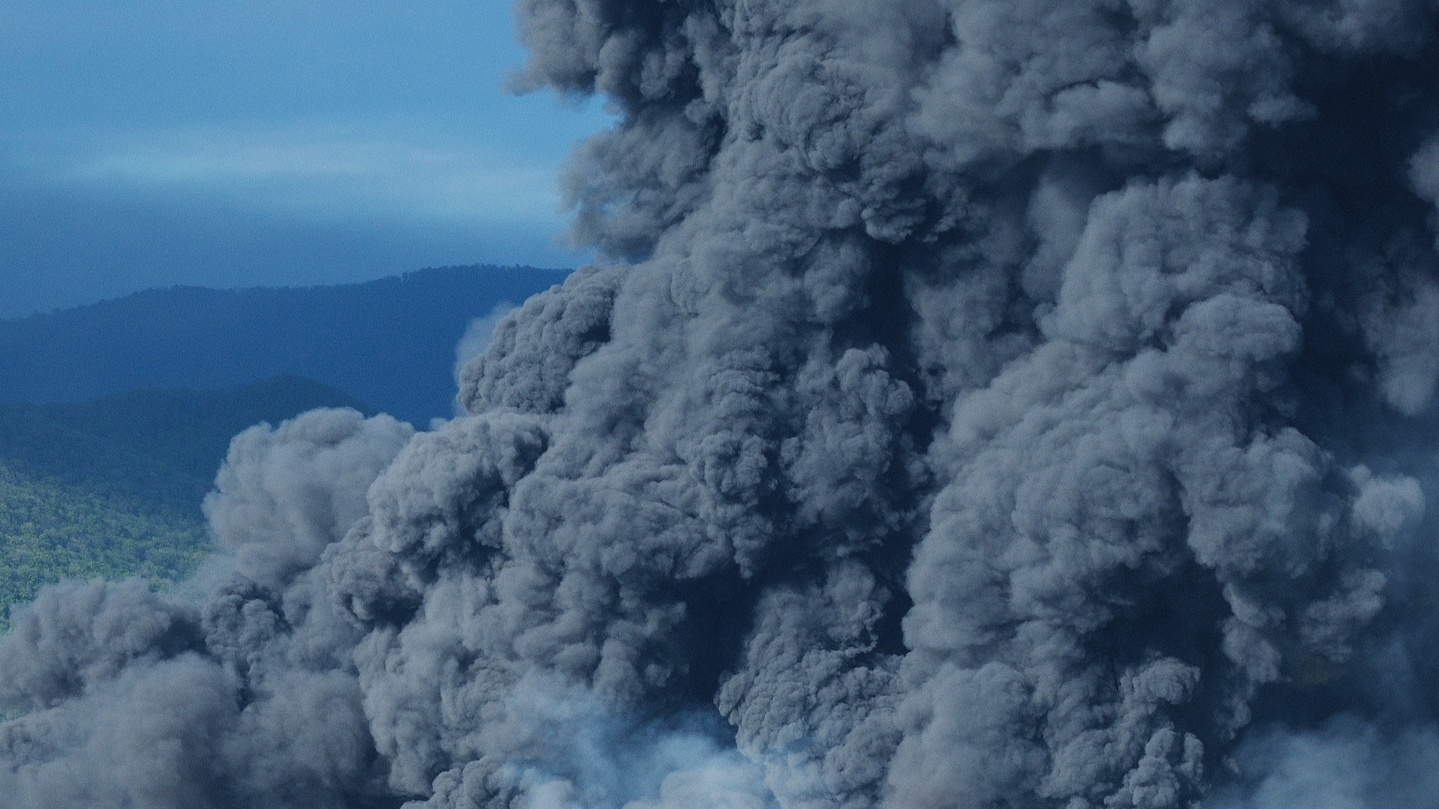 A smoke plume rises from an ongoing fire following a Ukrainian drone attack on an ⁠oil refinery in the Black Sea port ⁠of Tuapse, Krasnodar region, Russia, on April 28, 2026. /VCG