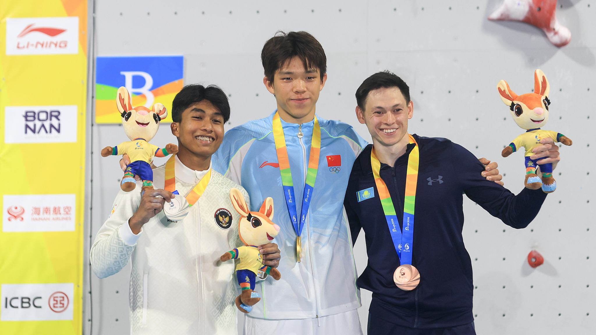 Zhao shatters world record to secure gold in men's speed climbing