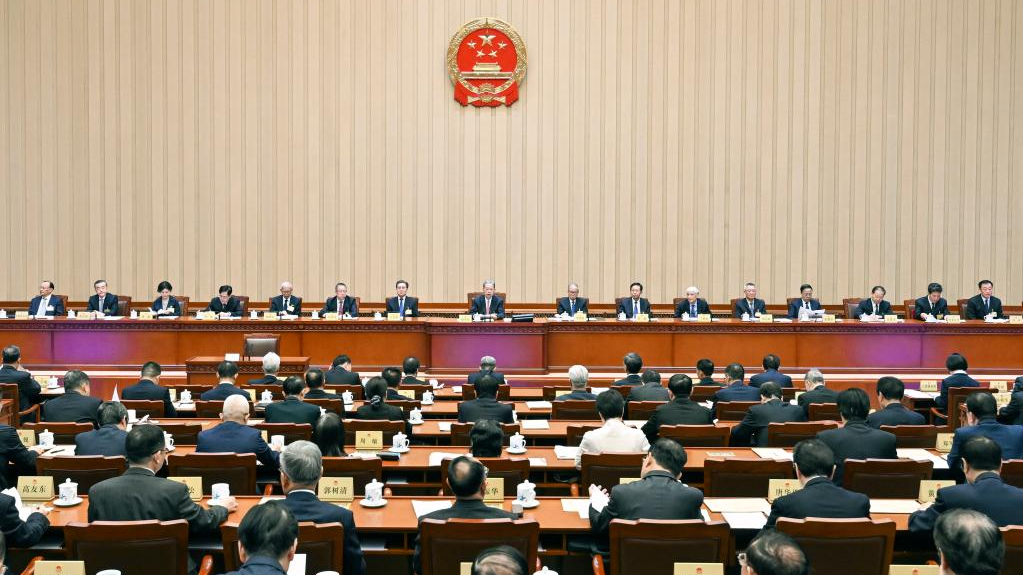 Zhao Leji, chairman of the National People's Congress (NPC) Standing Committee, presides over the closing meeting of the 22nd session of the 14th NPC Standing Committee at the Great Hall of the People in Beijing, capital of China, April 30, 2026. /Xinhua
