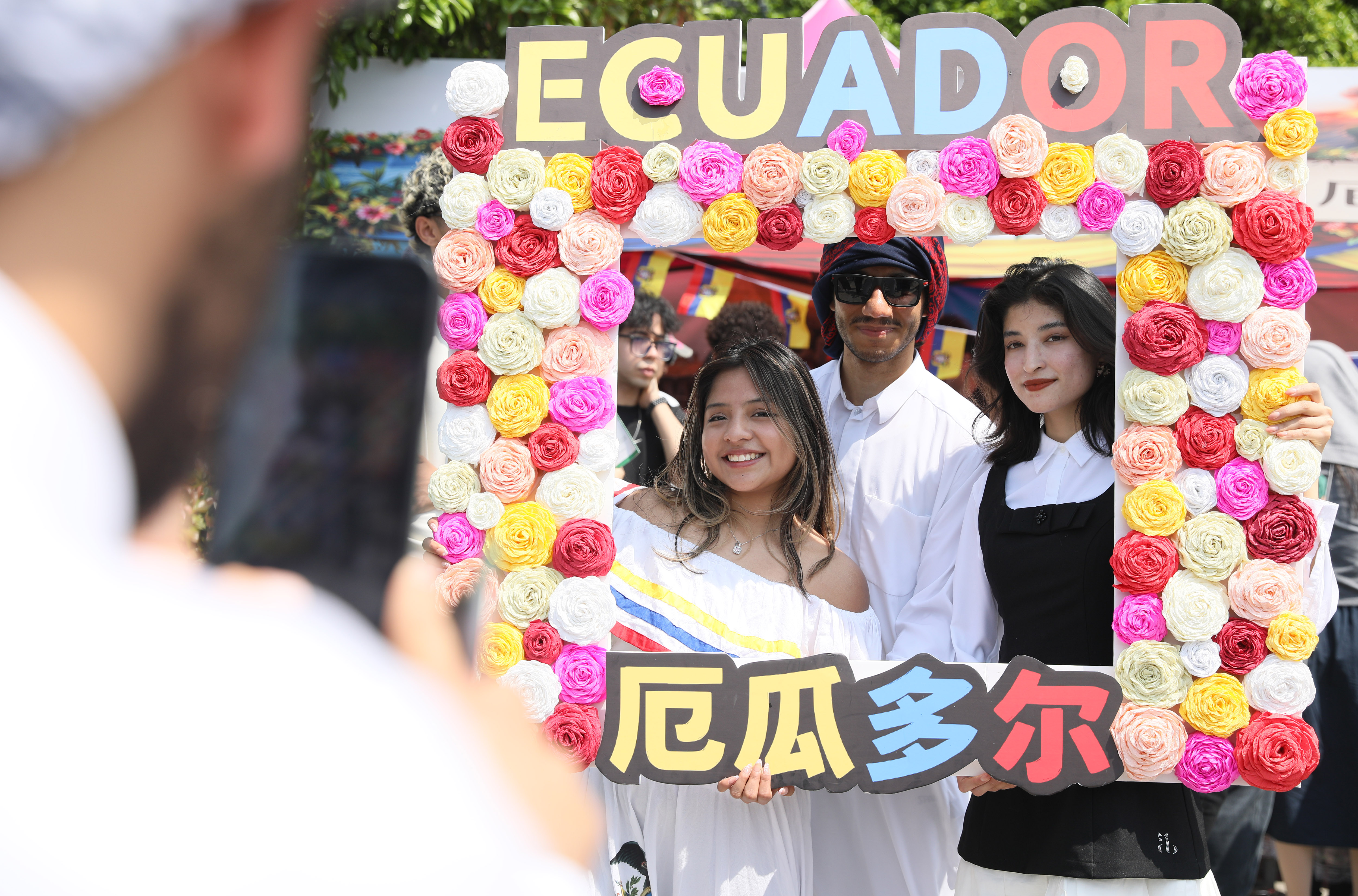 International students pose for photos at Jiangsu University's 16th International Culture Festival in Zhenjiang, east China's Jiangsu Province on April 25, 2026. /IC 