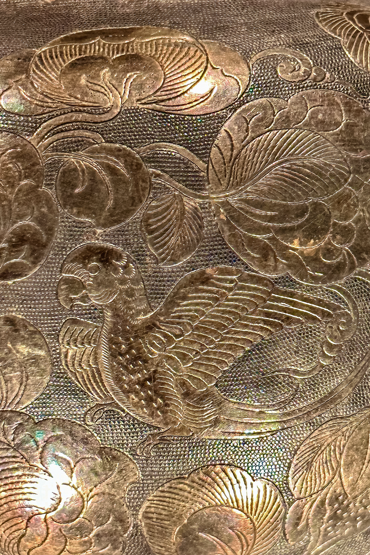 Parrot, gold and elixir: The Tang Dynasty silver jar with loop handle