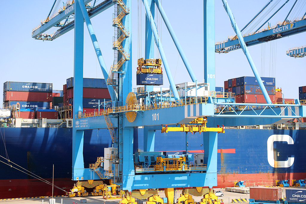 A cargo ship on a Southeast Asia route is loading and unloading goods at the dock of China's Qingdao Port, April 7, 2026. /VCG