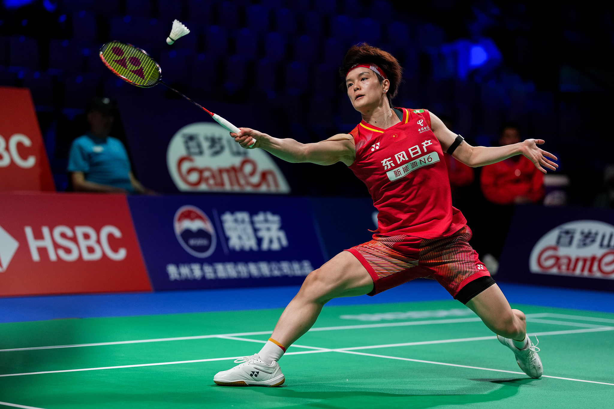 China's Wang Zhiyi hits a shot against Malaysia's Karupathevan Letshanaa in a women's singles match at the BWF Uber Cup quarterfinals in Horsens, Denmark, April 30, 2026. /VCG