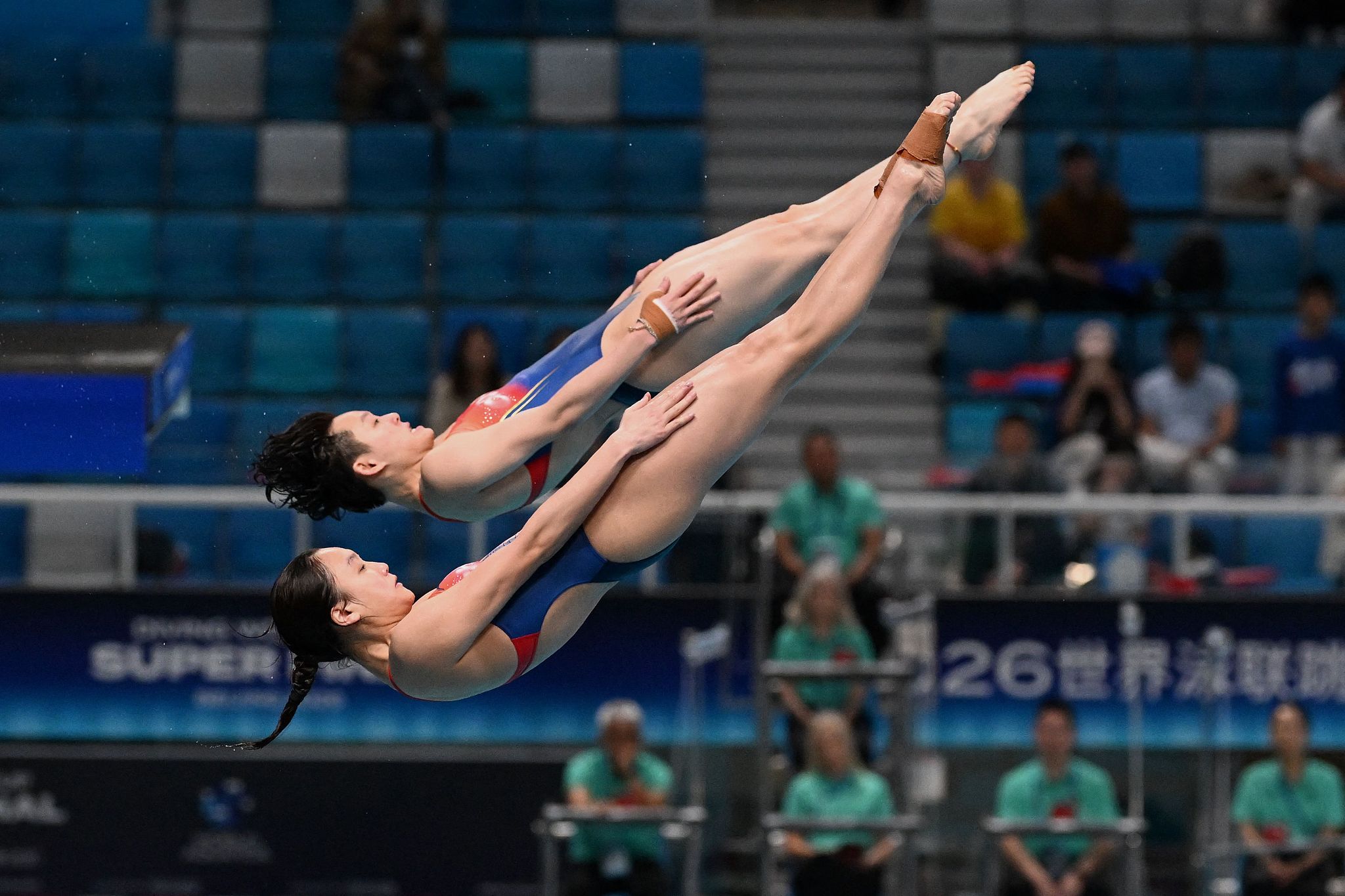 Chen Jia and Chen Yiwen of China compete in the women's 3m synchronised springboard at the World Aquatics Diving World Cup Super Finals 2026 in Beijing, China, May 1, 2026. /VCG