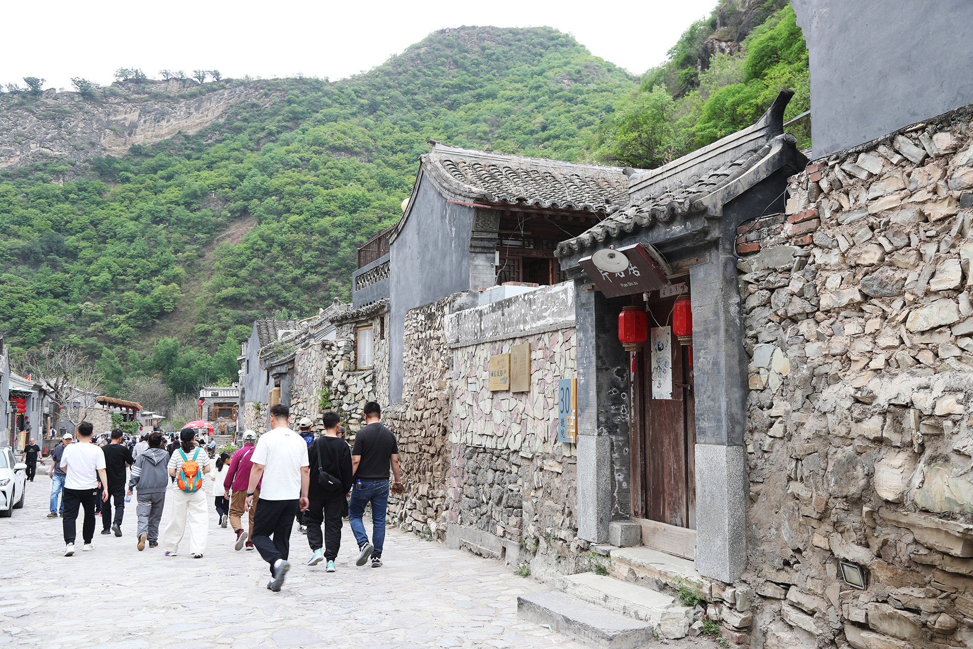 People visit Cuandixia Village in Beijing's Mentougou District. /CGTN