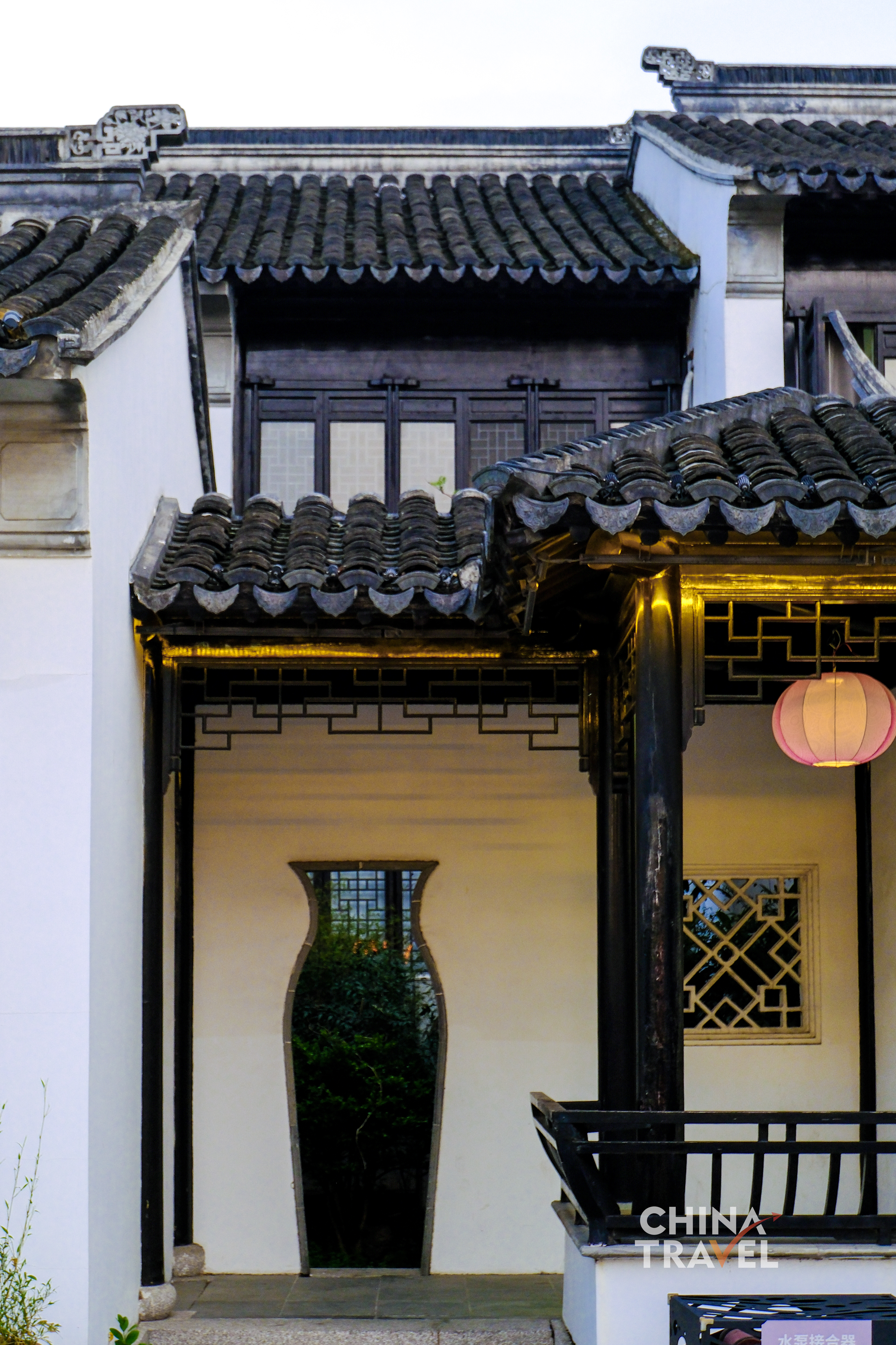 Traditional Jiangnan architecture stands alongside contemporary design, shaping a layered urban streetscape at the historic Shengjia She area in Suzhou, Jiangsu Province. /CGTN
