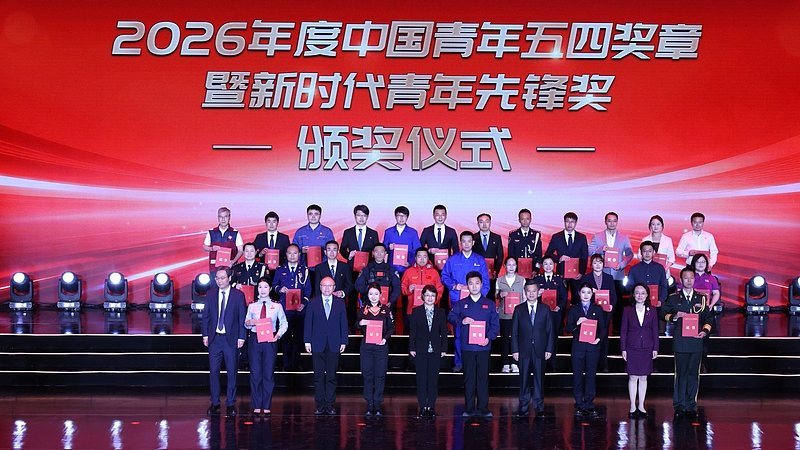 Awardees pose for a group photo during the 2026 China Youth May Fourth Medal and the New Era Youth Pioneer awards ceremony in Beijing, China, April 27, 2026. /VCG