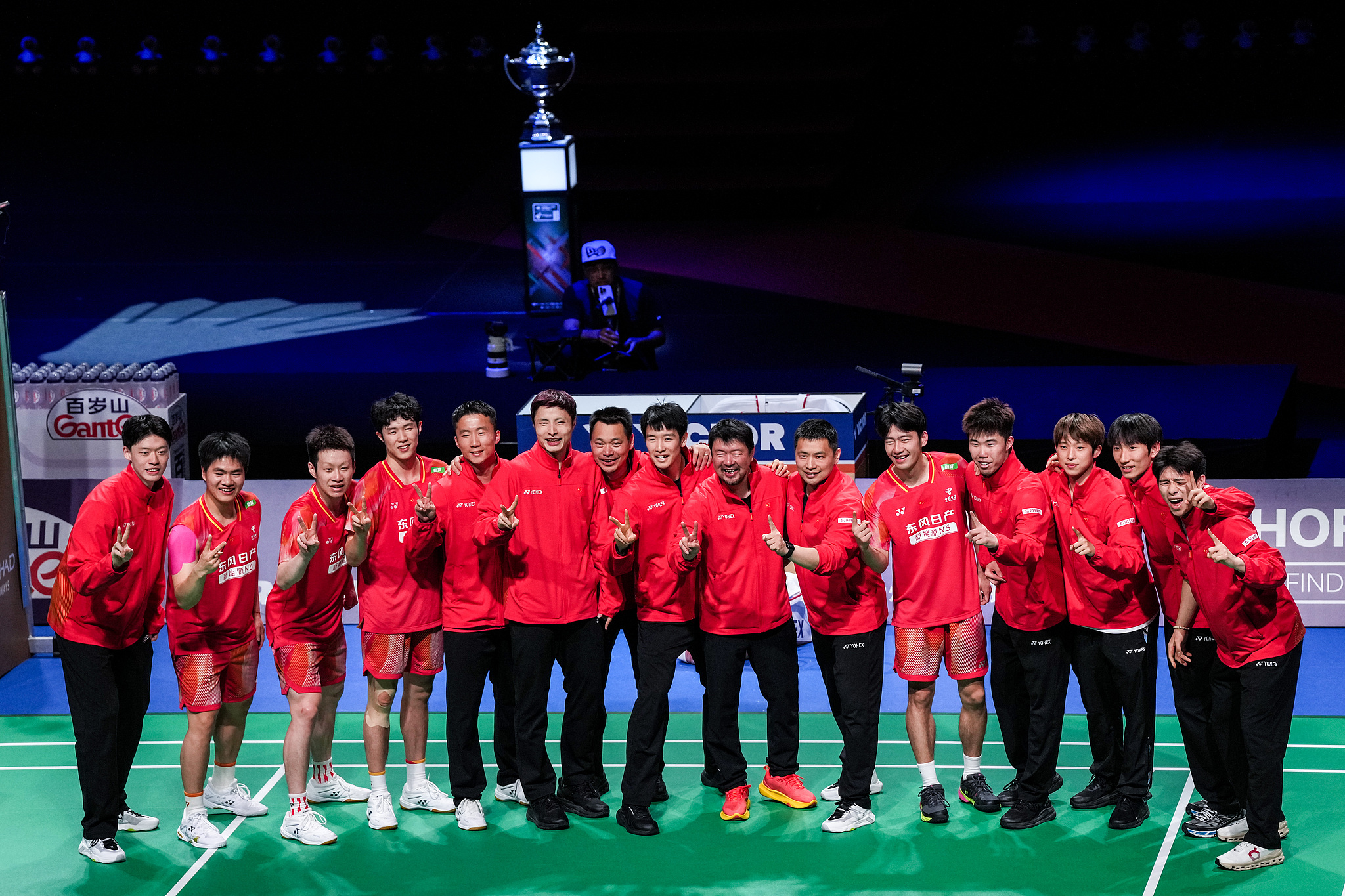 Players and coaches from the Chinese men's badminton team celebrate after defeating France in the BWF Thomas Cup Final in Horsens, Denmark, May 3, 2026. /VCG