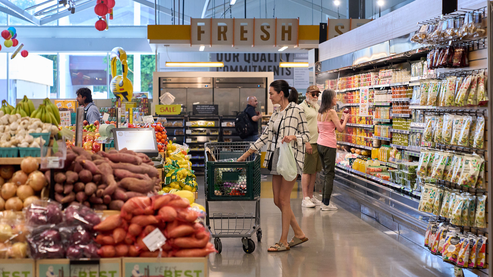 People shop for groceries at a store in Los Angeles, California, August 12, 2025. /CFP