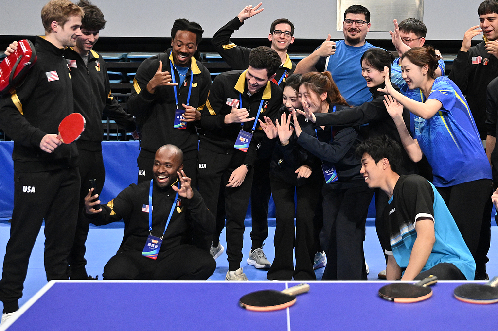 Chinese and American youths shoot interactive videos together at an event to commemorate the 55th anniversary of Ping-Pong Diplomacy in Beijing on April 10, 2026. /VCG