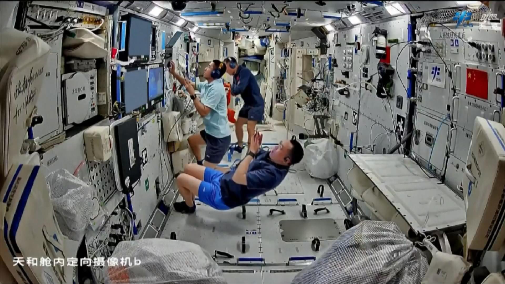 The Shenzhou-21 crew inside the China Space Station. /CMG