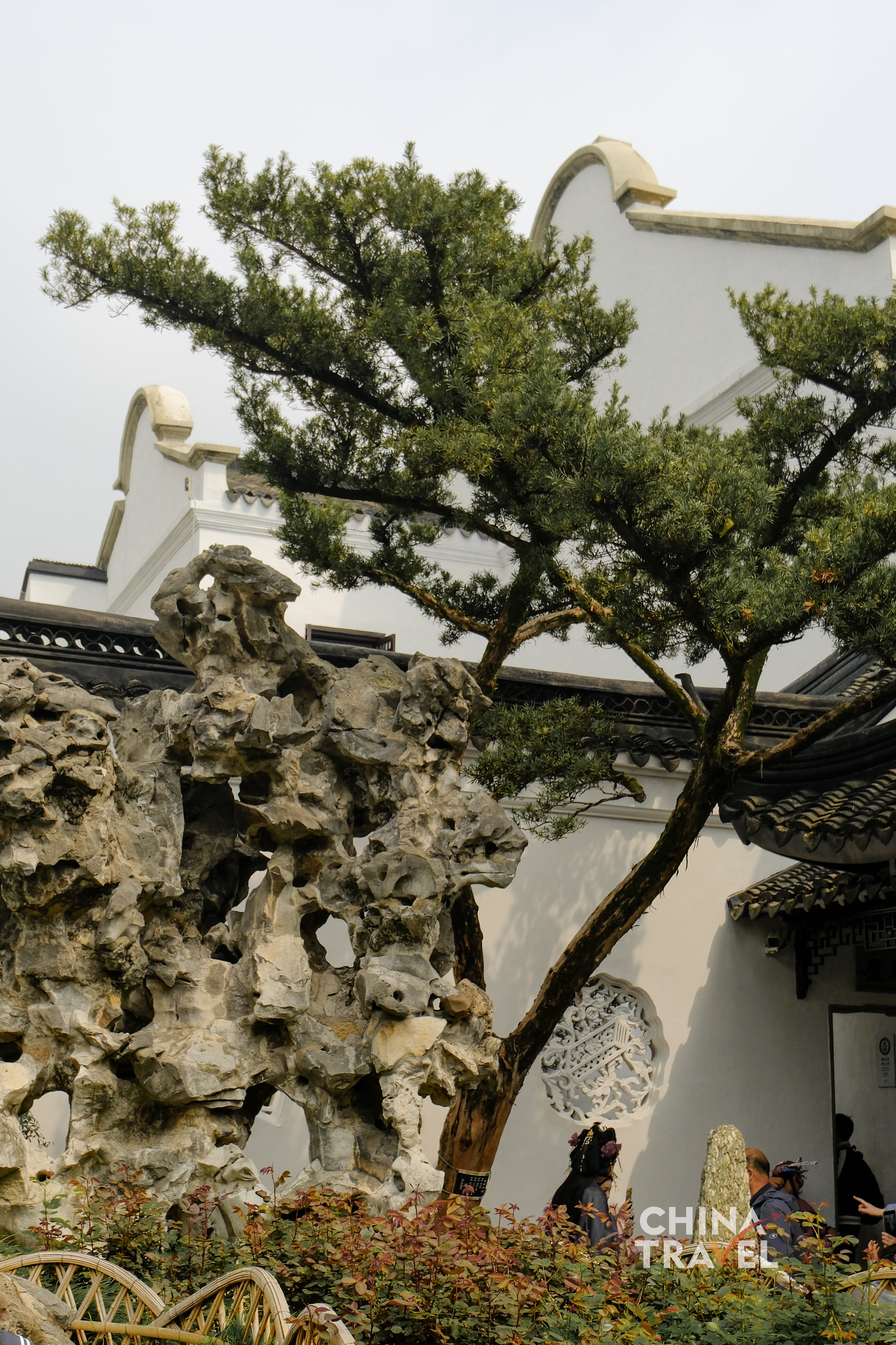 Limestone rockeries, trees and pavilions form shifting compositions as visitors move through winding paths. /CGTN